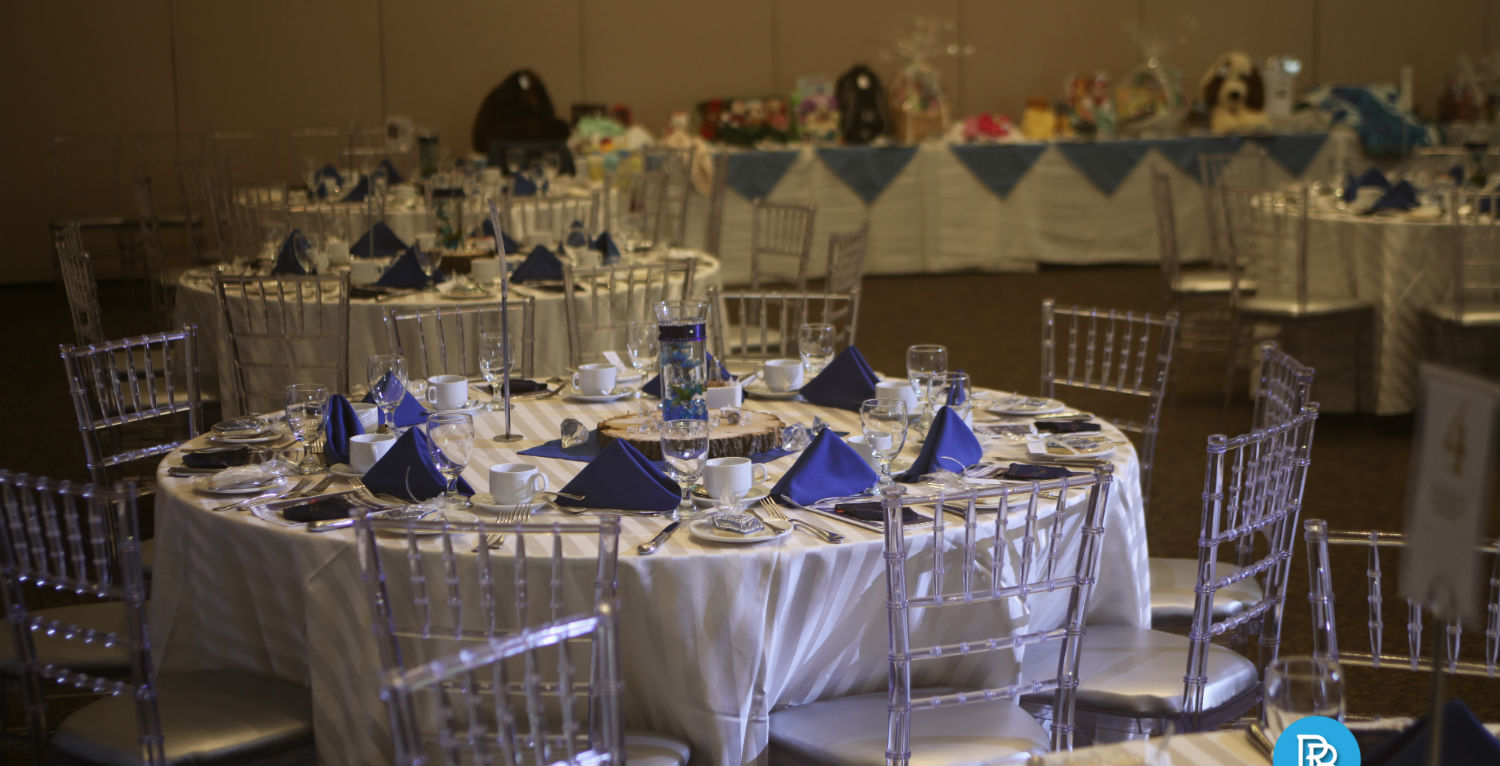 Elegant table setting with centrepieces and denim and diamonds themed decor at the 2018 Emajjin gala